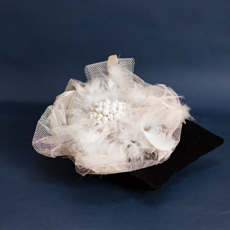 White floral hair accessory with pearls 