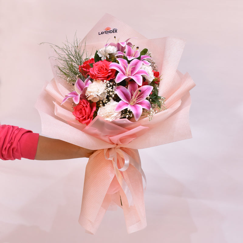 lilies.roses. white gypsophilia .green leaves 