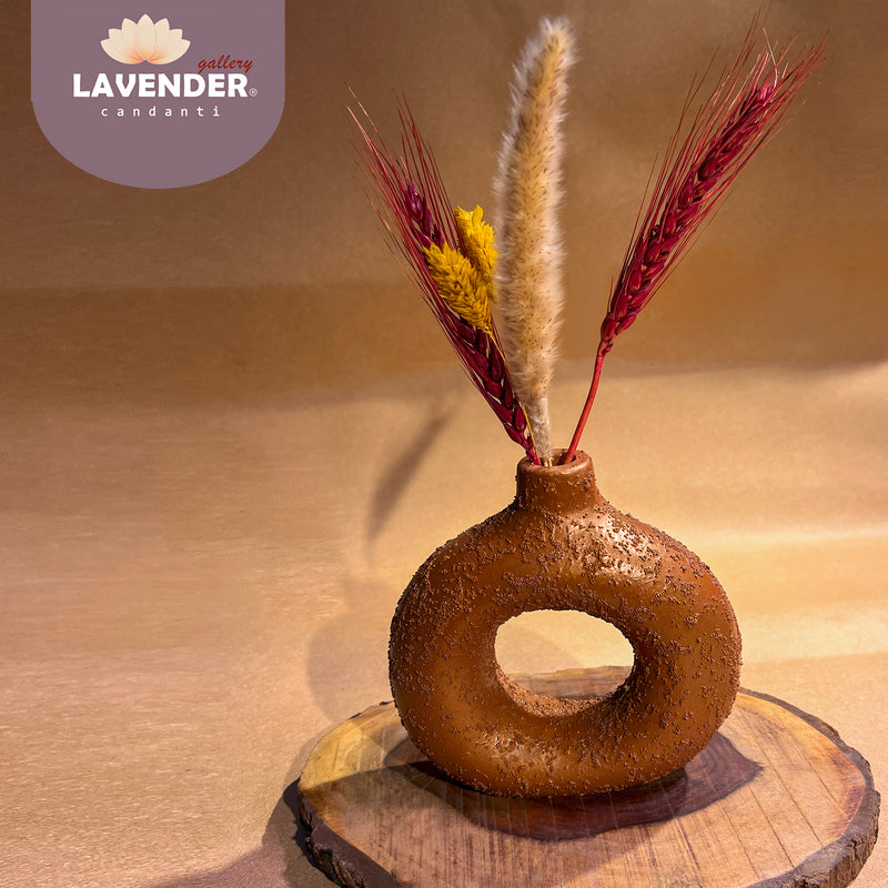 Decorative vase with dried plants 