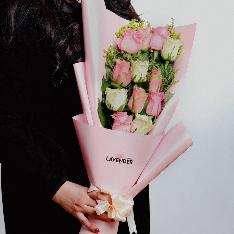 12 pink and white roses