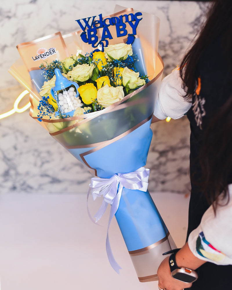 yellow and white roses and blue gypsophila