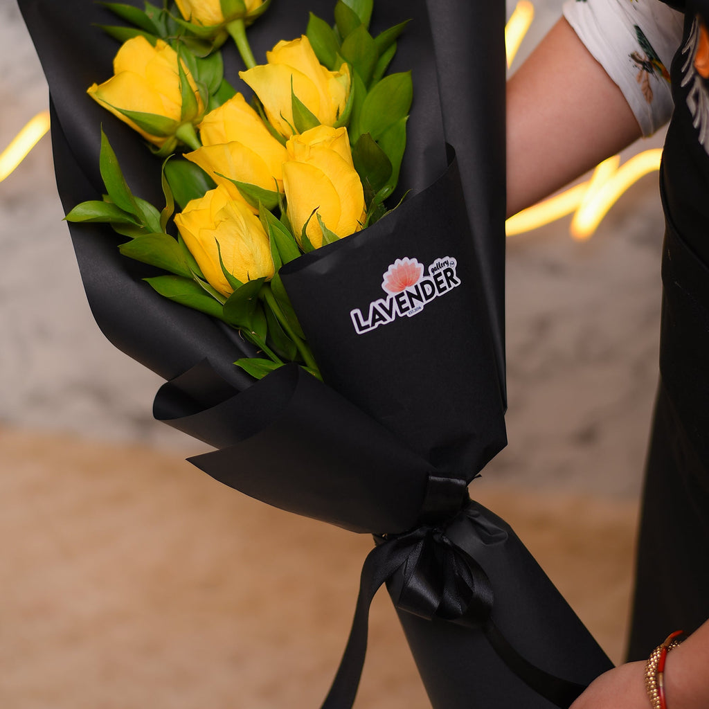 Yellow roses and green leaves