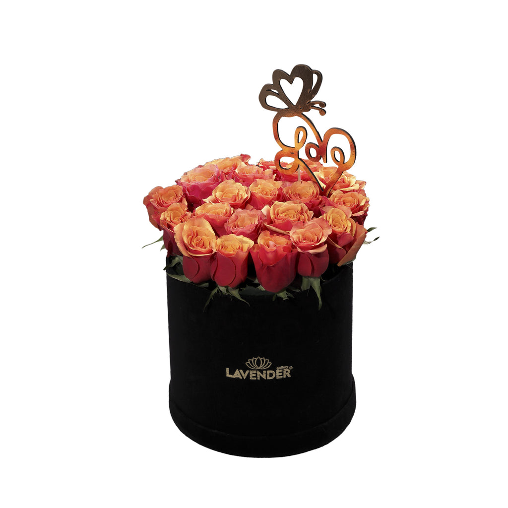 natural peach roses in black box