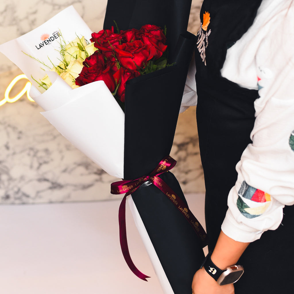 red and white roses and green leaves