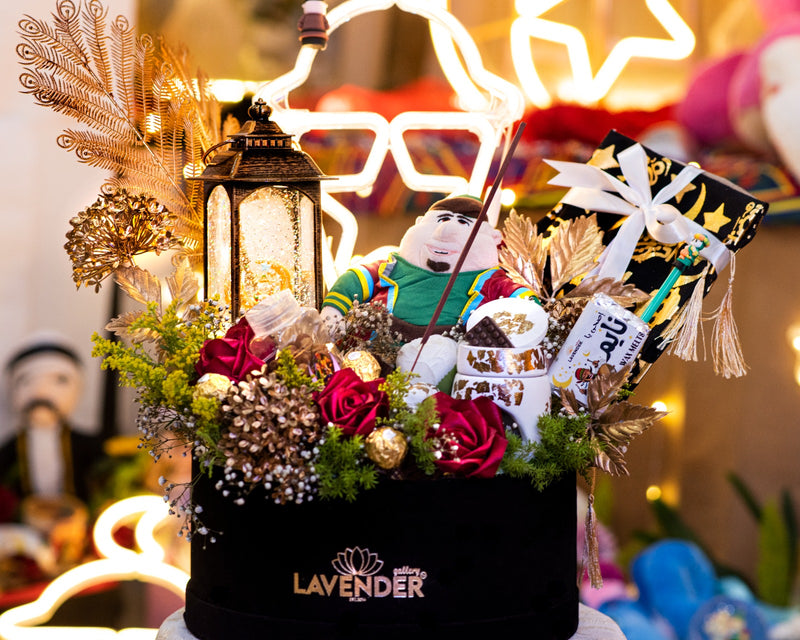 Decorative flower arrangement with plush toys and lantern, featuring the brand 'Lavender'.