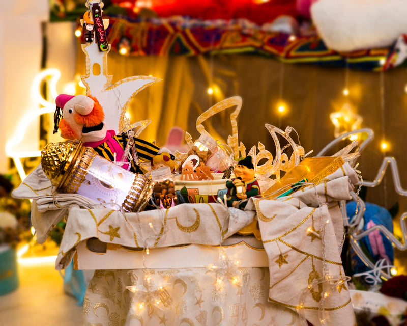 Decorative table with fairy lights, toys, and a colorful background